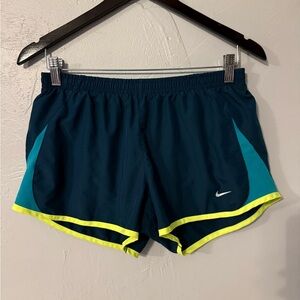 Nike Women's Medium Teal and Neon Yellow 3” running shorts